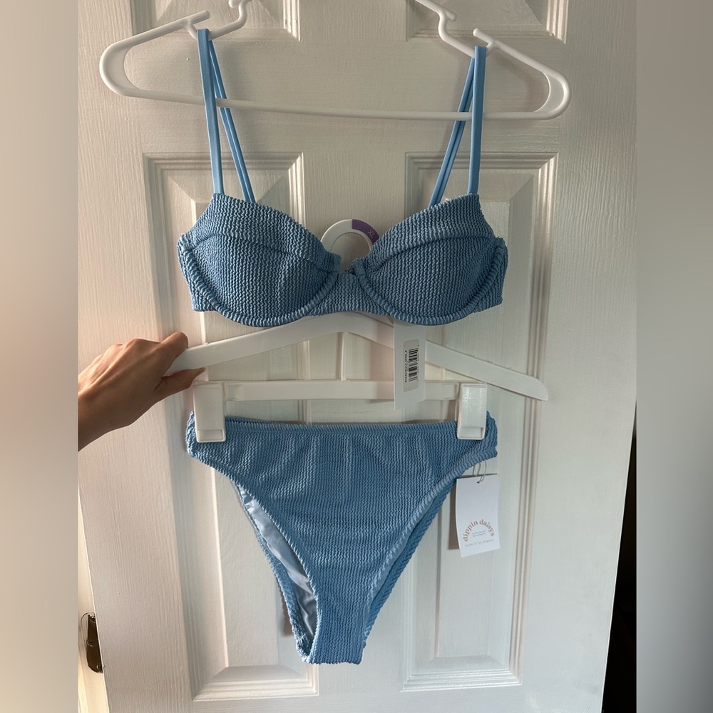 Open to offers!! Dippin Daisys bathing suit. Size small top and bottom.